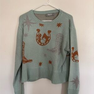 Chic Teal Sweater with Brown Accents